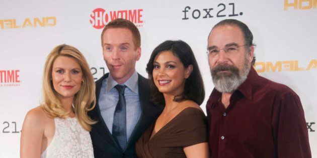 Cast members, from left, Claire Danes, Damian Lewis, Morena Baccarin, and Mandy Patinkin arrive at the private premiere screening for the 3rd Season of