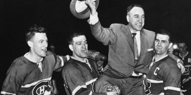 Montreal Canadian's players hoist their coach into the air after winning the Stanley Cup for the second year in succession in Montreal, Quebec on April 17, 1957. Left to right: Dickie Moore, left wing; Bernie Geoffrion, right wing; coach Hector âToeâ Blake; and Rocket Richard. (AP Photo)