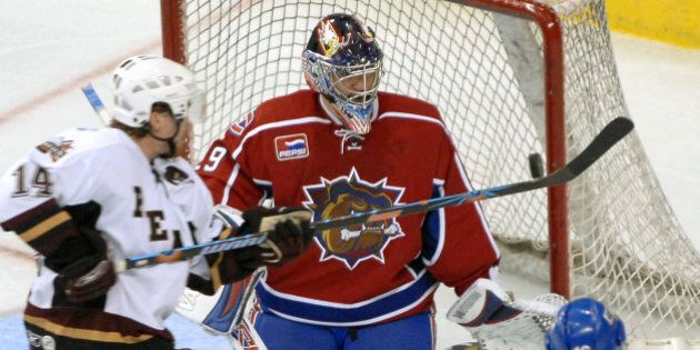 Hershey Bears left winger Tomas Fleischmann (14) tries to tip the puck past Hamilton Bulldogs goalie Carey Price (29) in the third period of Game 1 in the AHL Calder Cup hockey playoffs Friday, June 1, 2007, in Hershey, Pa. (AP Photo/Bradley C Bower)