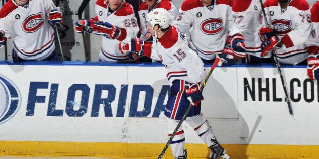 SUNRISE, FL - DECEMBER 30: Pierre-Alexandre Parenteau #15 of the Montreal Canadiens celebrates his shoot out goal with teammates against the Florida Panthers at the BB&T Center on December 30, 2014 in Sunrise, Florida. (Photo by Jeff Sanzare/NHLI via Getty Images)