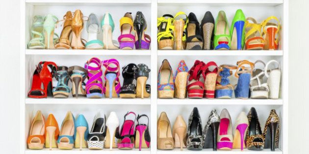 A Shoe Closet (wardrobe) with lots of colorfull High Heels shoes.