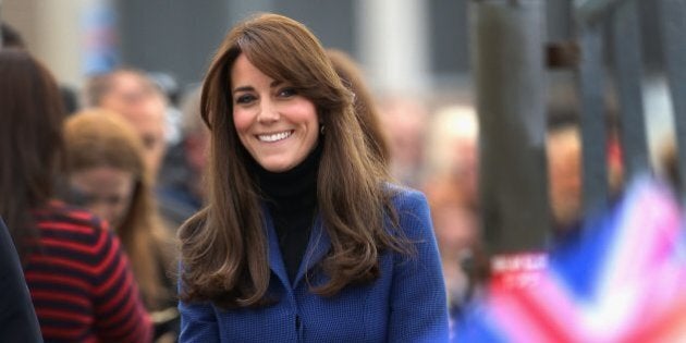 DUNDEE, SCOTLAND - OCTOBER 23: Children wave Union Jacks as Catherine, Duchess of Cambridge arrives at RSS Discovery as part of an away day to the Scottish City on October 23, 2015 in Dundee, Scotland. (Photo by Chris Jackson/Getty Images)