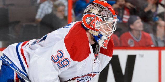OTTAWA, ON - OCTOBER 11: Goaltender Mike Condon #39 of the Montreal Canadiens looks on as he plays his first NHL game against the Ottawa Senators and records his first career win at Canadian Tire Centre on October 11, 2015 in Ottawa, Ontario, Canada. The Montreal Canadiens defeated the Ottawa Senators 3-1. (Photo by Minas Panagiotakis/Getty Images)