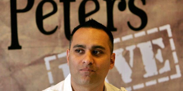 Canadian comedian Russell Peters looks on during a press conference in Bangalore, India, Monday, Feb. 26, 2007. Peters is scheduled to perform in three Indian cities, Bangalore, Mumbai and New Delhi starting Tuesday. (AP Photo/Aijaz Rahi)