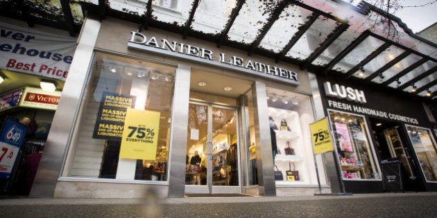 Sale signs are displayed outside of a Danier Leather store in downtown Vancouver, British Columbia, Canada, on Thursday, Feb. 4, 2016. Danier Leather filed a notice of intention to make a proposal (NOI) pursuant to provisions of the Bankruptcy and Insolvency Act. Photographer: Ben Nelms/Bloomberg via Getty Images