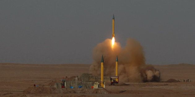 In this picture released by the Iranian Fars News Agency, asurface-to-surface missile is launched during the Iranian Revolutionary Guards maneuver in an undisclosed location in Iran, Tuesday, July 3, 2012. Iran's powerful Revolutionary Guards test fired several ballistic missiles on Tuesday, including a long-range variety capable of hitting U.S. bases in the region as well as Israel, Iranian media reported. (AP Photo/Fars News Agency, Hamed Jafarnejad)THE ASSOCIATED PRESS HAS NO WAY OF INDEPENDENTLY VERIFYING THE CONTENT, LOCATION OR DATE OF THIS IMAGE.