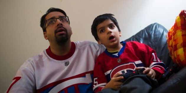 TORONTO, ON - JANUARY 4: Sulemaan Ahmed plays video games with his six year old son Adam Syed Ahmed at their home in Toronto, Ontario. Adam Ahmed is on a list the requires an additional security check. (Todd Korol/Toronto Star via Getty Images)