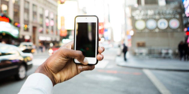 Man using phone to take picture