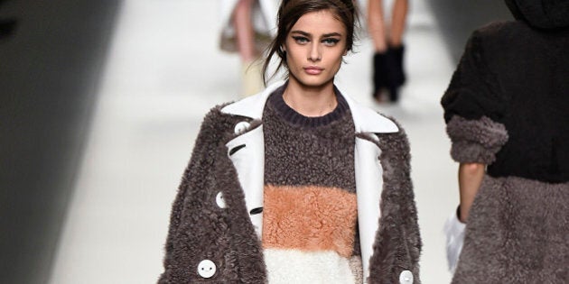 MILAN, ITALY - FEBRUARY 26: (BRAZIL OUT, NEW YORK TIMES OUT, T MAGAZINE OUT, UK VOGUE OUT) A model walks the runway at the Fendi show during the Milan Fashion Week Autumn/Winter 2015 on February 26, 2015 in Milan, Italy. (Photo by Victor VIRGILE/Gamma-Rapho via Getty Images)