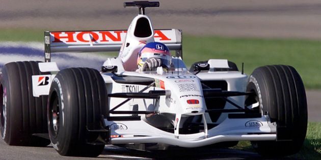 INDIANAPOLIS, UNITED STATES: Jacques Villeneuve of Canada takes his BAR Honda through a turn during the practice session 29 September, 2001 at the US Grand Prix at the Indianapolis Motor Speedway in Indianapolis, IN. The race will be held on 30 September. AFP PHOTO/Jeff HAYNES (Photo credit should read JEFF HAYNES/AFP/Getty Images)
