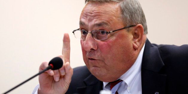 Gov. Paul LePage speaks at a town hall meeting Wednesday, Oct. 21, 2015, in Auburn, Maine. The Republican governor said that for Maine to become more competitive, the state must keep cutting taxes and energy costs while finding ways to attract more young families. (AP Photo/Robert F. Bukaty)