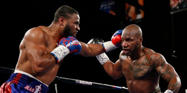 Jean Pascal hits Yuniesky Gonzalez during their light heavyweight boxing bout Saturday, July 25, 2015, in Las Vegas. (AP Photo/John Locher)