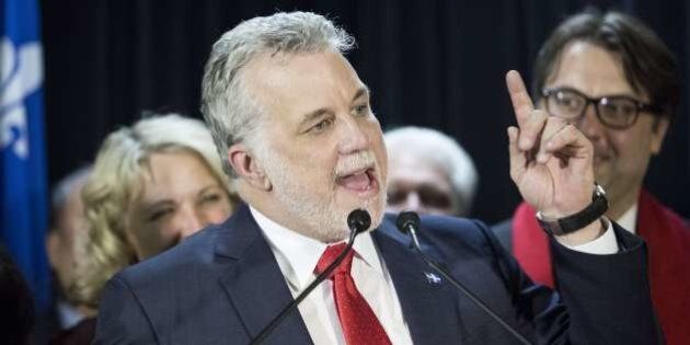 Quebec Liberal leader, Philippe Couillard(C), addresses supporters April 1, 2014 in Anjour-Louis-Riel, Canada. The elections are scheduled for April 7, 2014. AFP PHOTO/Francois Laplante Delagrave (Photo credit should read Francois Laplante Delagrave/AFP/Getty Images)
