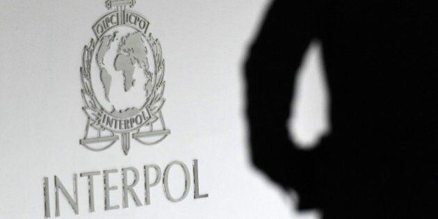 A logo at the newly completed Interpol Global Complex for Innovation building is seen during the inauguration opening ceremony in Singapore on April 13, 2015. The Interpol Global Centre for Innovation opened its doors with officials hoping it will strengthen global efforts to fight increasingly tech-savvy international criminals. AFP PHOTO / ROSLAN RAHMAN (Photo credit should read ROSLAN RAHMAN/AFP/Getty Images)
