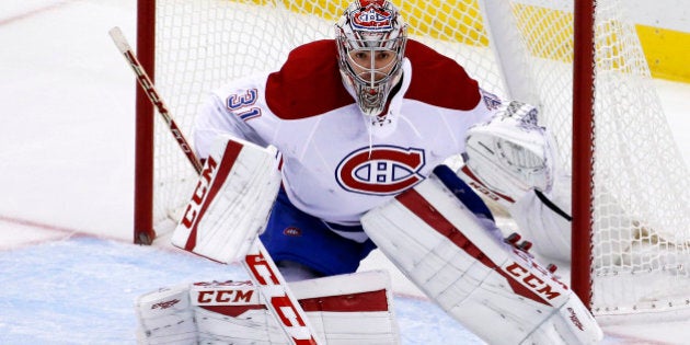 Montreal Canadiens goalie Carey Price (31) plays during an NHL hockey game against the Pittsburgh Penguins in Pittsburgh Tuesday, Oct. 13, 2015.(AP Photo/Gene J. Puskar