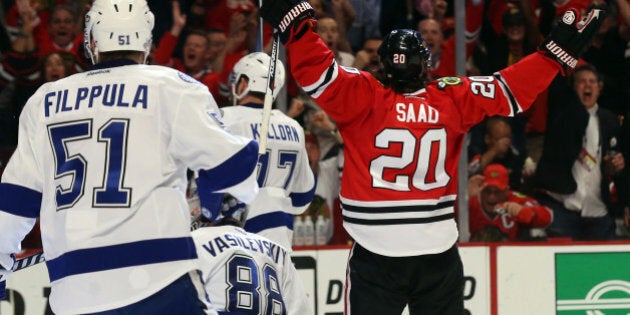 CHICAGO, IL - JUNE 10: Brandon Saad #20 of the Chicago Blackhawks celebrates after scoring a goal in the third period against Andrei Vasilevskiy #88 of the Tampa Bay Lightning during Game Four of the 2015 NHL Stanley Cup Final at the United Center on June 10, 2015 in Chicago, Illinois. (Photo by Bruce Bennett/Getty Images)