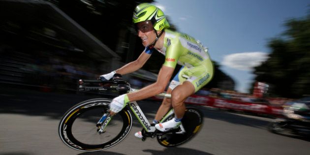 Ivan Basso of Italy competes in the prologue of the Tour de France cycling race, an individual time trial over 6,4 kilometers (4 miles) with start and finish in Liege, Belgium, Saturday June 30 2012. (AP Photo/Christophe Ena)