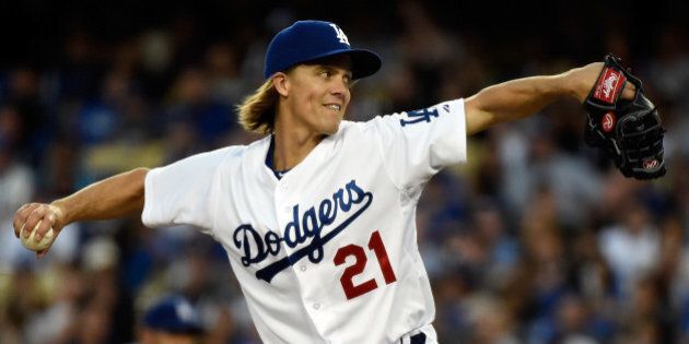 LOS ANGELES, CA - APRIL 18: Zack Greinke #21 of the Los Angeles Dodgers pitches in the third inning against the Colorado Rockies at Dodger Stadium on April 18, 2015 in Los Angeles, California. (Photo by Lisa Blumenfeld/Getty Images)