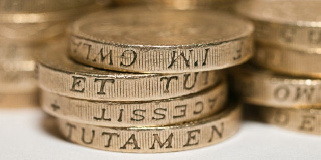 Macro study of a bunch of £1 pound coinsPERMISSION TO USE: you are welcome to use this photo free of charge for any purpose including commercial. I am not concerned with how attribution is provided - a link to my flickr page or my name is fine. If the used in a context where attribution is impractical, that's fine too. I want my photography to be shared widely. I like hearing about where my photos have been used so please send me links, screenshots or photos where possible.