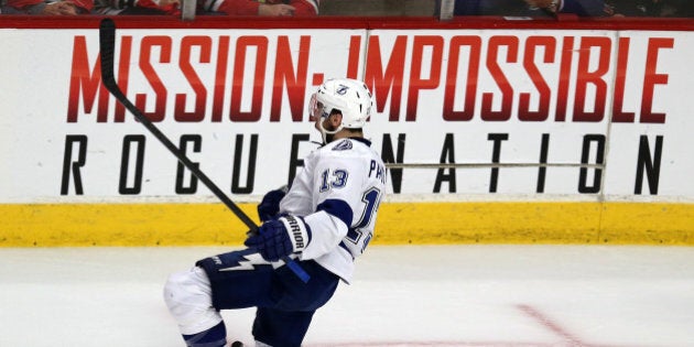 CHICAGO, IL - JUNE 08: Cedric Paquette #13 of the Tampa Bay Lightning celebrates after scoring the game winning goal against the Chicago Blackhawks during Game Three of the 2015 NHL Stanley Cup Final at the United Center on June 8, 2015 in Chicago, Illinois. The Lightning defeated the Blackhawks 3-2. (Photo by Jonathan Daniel/Getty Images)