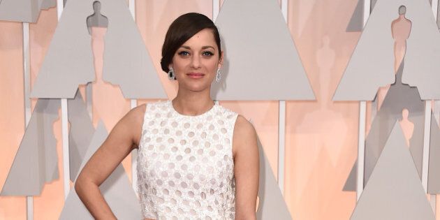 Marion Cotillard arrives at the Oscars on Sunday, Feb. 22, 2015, at the Dolby Theatre in Los Angeles. (Photo by Jordan Strauss/Invision/AP)