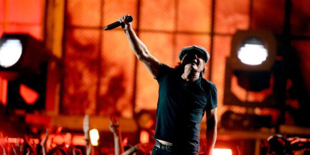 LOS ANGELES, CA - FEBRUARY 08: Singer Brian Johnson of AC/DC perform onstage during The 57th Annual GRAMMY Awards at STAPLES Center on February 8, 2015 in Los Angeles, California. (Photo by Michael Tran/FilmMagic)