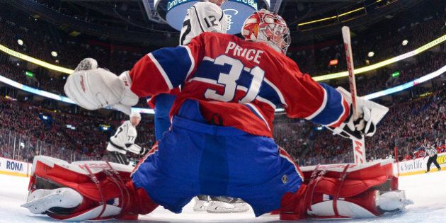 MONTREAL, QC - DECEMBER 12: Carey Price #31 of the Montreal Canadiens makes a blocker save against Marian Gaborik #12 of the Los Angeles Kings in the NHL game at the Bell Centre on December 12, 2014 in Montreal, Quebec, Canada. (Photo by Francois Lacasse/NHLI via Getty Images)