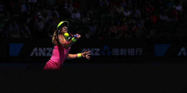 MELBOURNE, AUSTRALIA - JANUARY 25: Eugenie Bouchard of Canada plays a forehand in her fourth round match against Irina-Camelia Begu of Romania during day seven of the 2015 Australian Open at Melbourne Park on January 25, 2015 in Melbourne, Australia. (Photo by Michael Dodge/Getty Images)