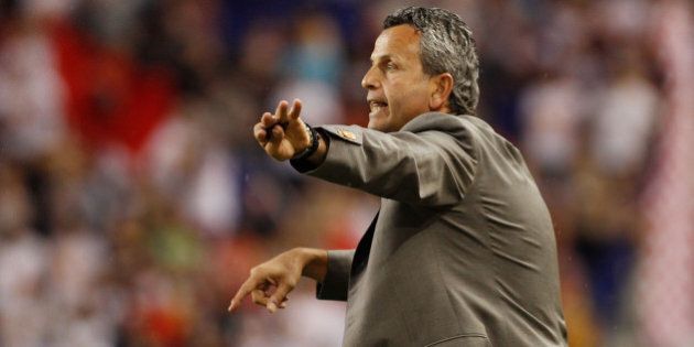 HARRISON, NJ - AUGUST 13: Head Coach Frank Klopas of the Chicago Fire reacts from the sideline during the match against the New York Red Bulls on August 13, 2011 at Red Bull Arena in Harrison, New Jersey. (Photo by Mike Stobe/Getty Images for New York Red Bulls)
