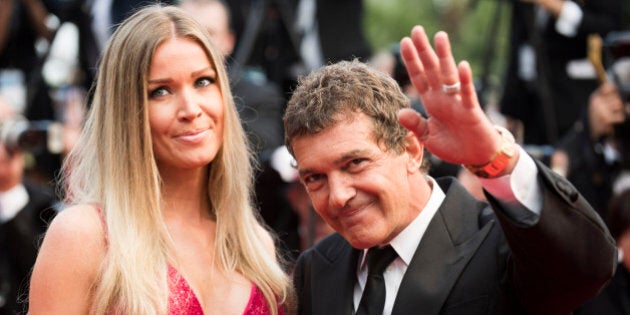 Nicole Kempel and Antonio Banderas pose for photographers as she arrives for the screening of the film Sicario at the 68th international film festival, Cannes, southern France, Tuesday, May 19, 2015. (Photo by Arthur Mola/Invision/AP)