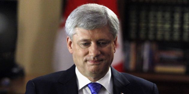 Stephen Harper, Canada's prime minister, looks on after a Bloomberg Television interview in Ottawa, Ontario, Canada, on Wednesday, July 29, 2015. Harper said U.S. delays in approving the Keystone XL pipeline are 'not a hopeful sign' and reflect the 'peculiar politics' of the Obama administration. Photographer: Patrick Doyle/Bloomberg via Getty Images