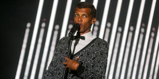 Stromae performs at the 2015 Coachella Music and Arts Festival on Sunday, April 19, 2015, in Indio, Calif. (Photo by Rich Fury/Invision/AP)