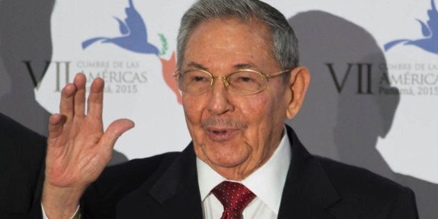 Cuba's President Raul Castro waves as he arrives to the Summit of the Americas inauguration ceremony in Panama City, Friday, April 10, 2015. (AP Photo/Moises Castillo)