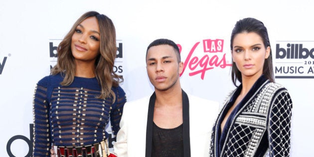 Jourdan Dunn, from left, Olivier Rousteing, and Kendall Jenner arrive at the Billboard Music Awards at the MGM Grand Garden Arena on Sunday, May 17, 2015, in Las Vegas. (Photo by Eric Jamison/Invision/AP)