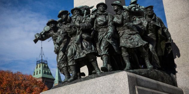 OTTAWA, ON - OCTOBER 24: The National War Memorial, where Cpl. Nathan Cirillo of the Canadian Army Reserves was killed by a lone gunman two days ago while standing guard memorial, is seen on October 24, 2014 in Ottawa, Ontario, Canada. After killing Cirillo the gunman stormed the main parliament building, terrorizing the public and politicians, before he was shot dead. (Photo by Andrew Burton/Getty Images)
