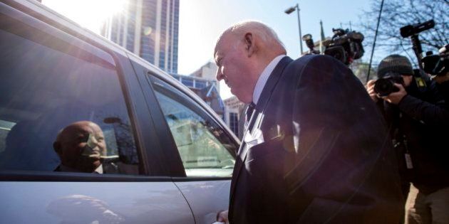 Suspended senator Mike Duffy leaves the courthouse in Ottawa, Ont. following his first court appearance on Tuesday, April 7, 2015. Duffy is facing 31 charges of fraud, breach of trust, bribery, frauds on the government related to inappropriate Senate expenses. THE CANADIAN PRESS/Justin Tang
