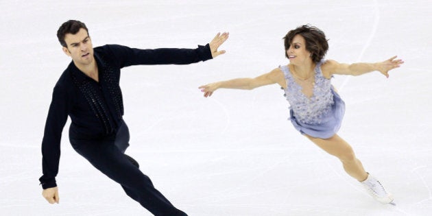 SHANGHAI, CHINA - MARCH 25: Meagan Duhamel and Eric Radford of Canada perform during the Pairs Short Program on day one of the 2015 ISU World Figure Skating Championships at Shanghai Oriental Sports Center on March 25, 2015 in Shanghai, China. (Photo by Xiaolu Chu/Getty Images)