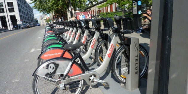 Some bicycles of BIXI - the word is a contraction of Bicycle and Taxi - the sharing system of Montreal, are seen on September 14, 2011 in Montreal Canada. The bicycle is designed and produced in Canada and made of aluminium. The city of New York announced on September 14, 2011 a plan to buy 10,000 of these bicycles for the American partner Alta Bicycle Share. The bicycles and parking-stations for New York will be produced in Canada. AFP PHOTO / Guillaume LAVALLEE (Photo credit should read Guillaume LavallÃ©e/AFP/Getty Images)