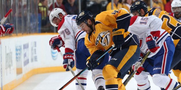 NASHVILLE, TN - MARCH 24: Taylor Beck #41 of the Nashville Predators battles for the puck against Andrei Markov #79 of the Montreal Canadiens during an NHL game at Bridgestone Arena on March 24, 2015 in Nashville, Tennessee. (Photo by John Russell/NHLI via Getty Images)