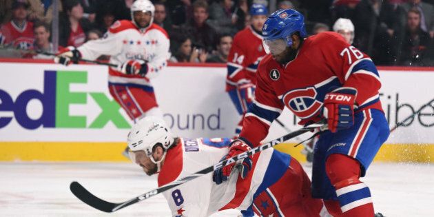 MONTREAL, QC - APRIL 2: P.K. Subban #76 of the Montreal Canadiens and Alex Ovechkin #8 of the Washington Capitals fight for the puck in the NHL game at the Bell Centre on April 2, 2015 in Montreal, Quebec, Canada. (Photo by Francois Lacasse/NHLI via Getty Images)