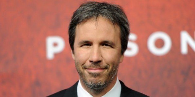 In this picture taken Thursday Sept. 26, 2013 Canadian film director Denis Villeneuve, arrives for the premiere of the new film 'Prisoners' in Berlin, Germany. The thriller will start in German cinemas on Oct. 10, 2013. (AP Photo/dpa, Britta Pedersen)