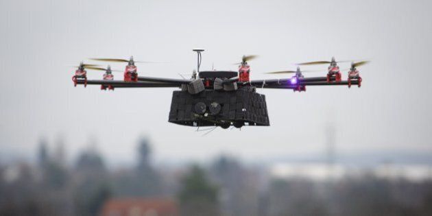 A SteadiDrone EI8GHT Octocopter undergoes a test flight in a field outside the headquarters of Mensuro Ltd., a distributor for SteadiDrone Ltd. products, in Pilsen, Czech Republic, on Tuesday, Dec. 10, 2013. Amazon.com Inc. expects to be ready for drone implementation by 2015, which is when the Federal Aviation Administration is due to finalize rules on domestic use of the technology by both government and commercial entities, according to statements made by Amazon Chief Executive Officer Jeff Bezos during a Dec. 1 broadcast of '60 Minutes.' Photographer: Martin Divisek/Bloomberg via Getty Images