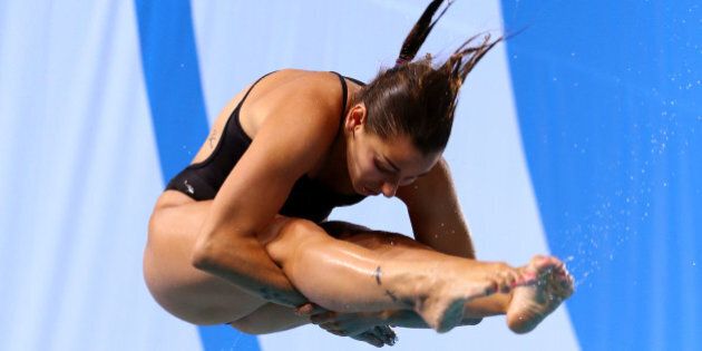 EDINBURGH, SCOTLAND - AUGUST 01: Pamela Ware of Canada competes in the Women's 1m Springboard Final at Royal Commonwealth Pool during day nine of the Glasgow 2014 Commonwealth Games on August 1, 2014 in Edinburgh, Scotland. (Photo by Quinn Rooney/Getty Images)