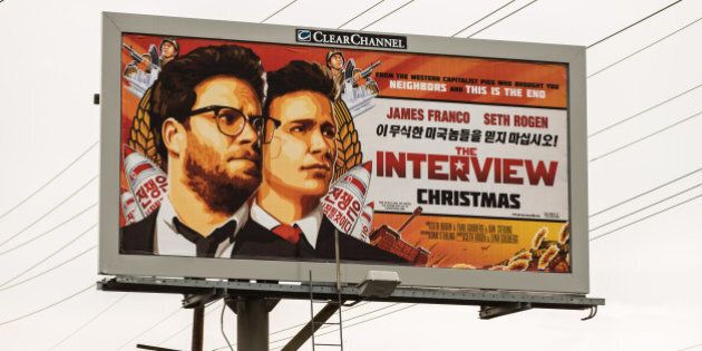 LOS ANGELES, CA - DECEMBER 19: A billboard for the film 'The Interview' is displayed December 19, 2014 in Venice, California. Sony has canceled the release of the film after a hacking scandal that exposed sensitive internal Sony communications, and threatened to attack theaters showing the movie. (Photo by Christopher Polk/Getty Images)