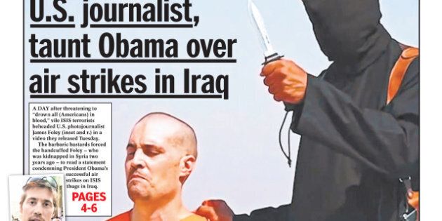 Daily News front page Agusut 20, 2014, SAVAGES - ISIS monster behead U.S. journalist, taunt Obama over air strikes in Iraq - James Foley. (Photo By: /NY Daily News via Getty Images)