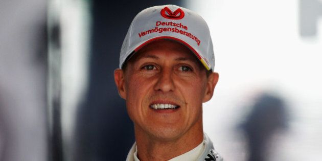 HOCKENHEIM, GERMANY - JULY 20: Michael Schumacher of Germany and Mercedes GP prepares to drive during practice for the German Grand Prix at Hockenheimring on July 20, 2012 in Hockenheim, Germany. (Photo by Lars Baron/Getty Images)
