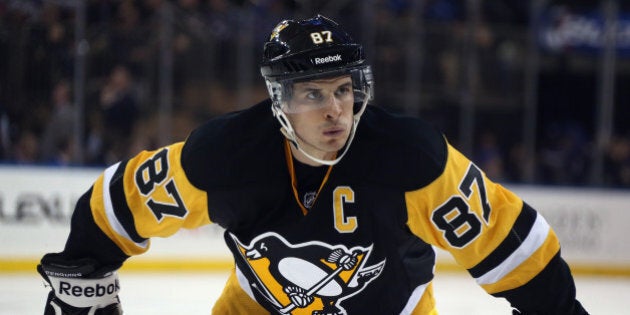 NEW YORK, NY - DECEMBER 08: Sidney Crosby #87 of the Pittsburgh Penguins prepares to take the faceoff against the New York Rangers at Madison Square Garden on December 8, 2014 in New York City. The Rangers defeated the Penguins 4-3 in overtime. (Photo by Bruce Bennett/Getty Images)