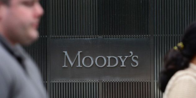 A sign for Moody's rating agency is displayed at the company headquarters in New York, September 18, 2012. AFP PHOTO/Emmanuel Dunand (Photo credit should read EMMANUEL DUNAND/AFP/GettyImages)