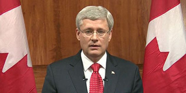 In this frame grab taken from video, Canada Prime Minister Stephen Harper speaks during a televised address to the nation in Ottawa, Ontario, Wednesday, Oct. 22, 2014. A masked gunman killed a soldier standing guard at Canadaâs war memorial Wednesday, then stormed Parliament in an attack that was stopped cold when he was shot to death by the ceremonial sergeant-at-arms. Harper called it the countryâs second terrorist attack in three days. (AP Photo/APTN, Pool)