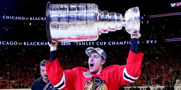 CHICAGO, IL - JUNE 15: Teuvo Teravainen #86 of the Chicago Blackhawks celebrates with the Stanley Cup after defeating the Tampa Bay Lightning by a score of 2-0 in Game Six to win the 2015 NHL Stanley Cup Final at the United Center on June 15, 2015 in Chicago, Illinois. (Photo by Bruce Bennett/Getty Images)